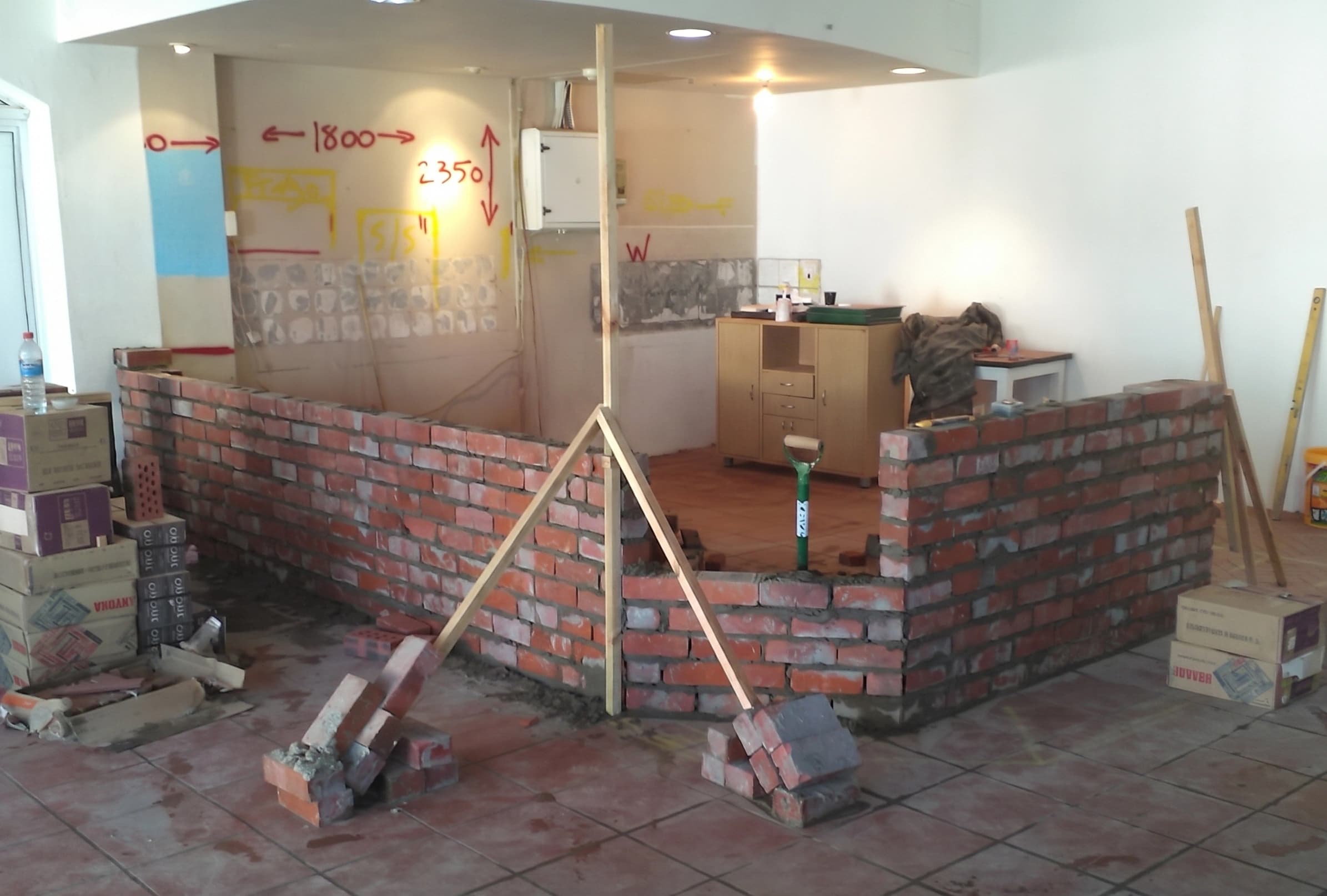 I Love Waffles Simon's Town fit-out, early-stage brick counter construction