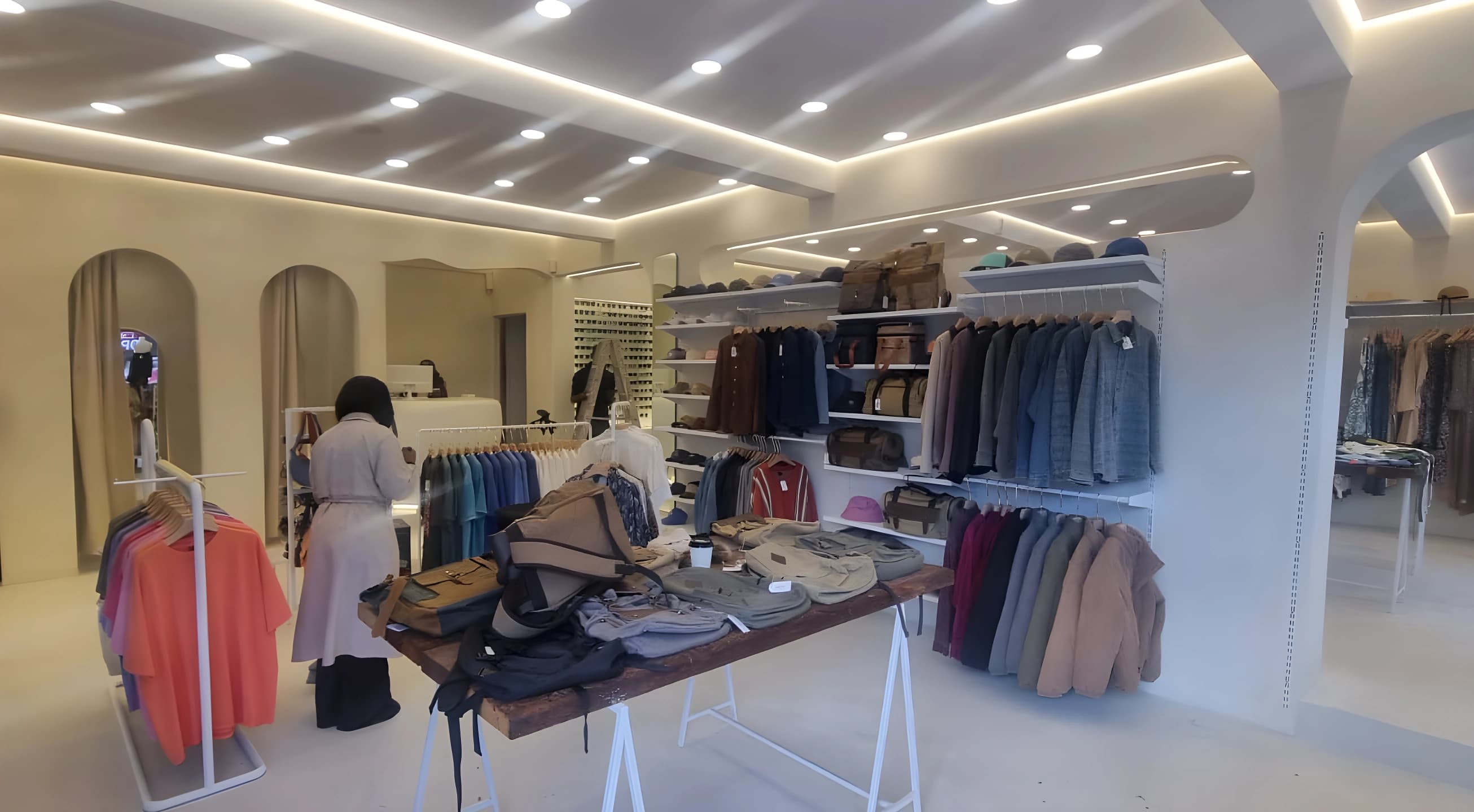 The completed Unseen retail interior with custom stepped ceiling bulkheads